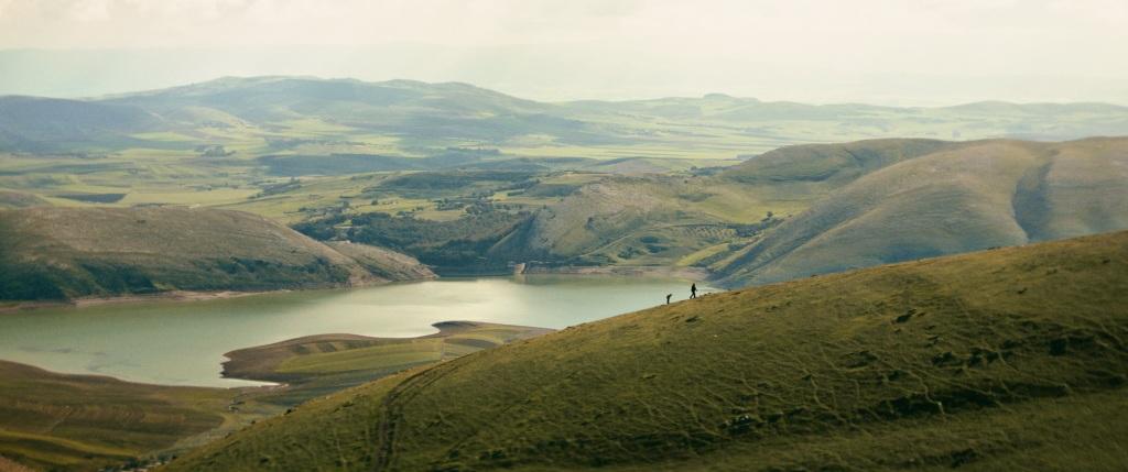 Behind the Mountains Behind the Mountains