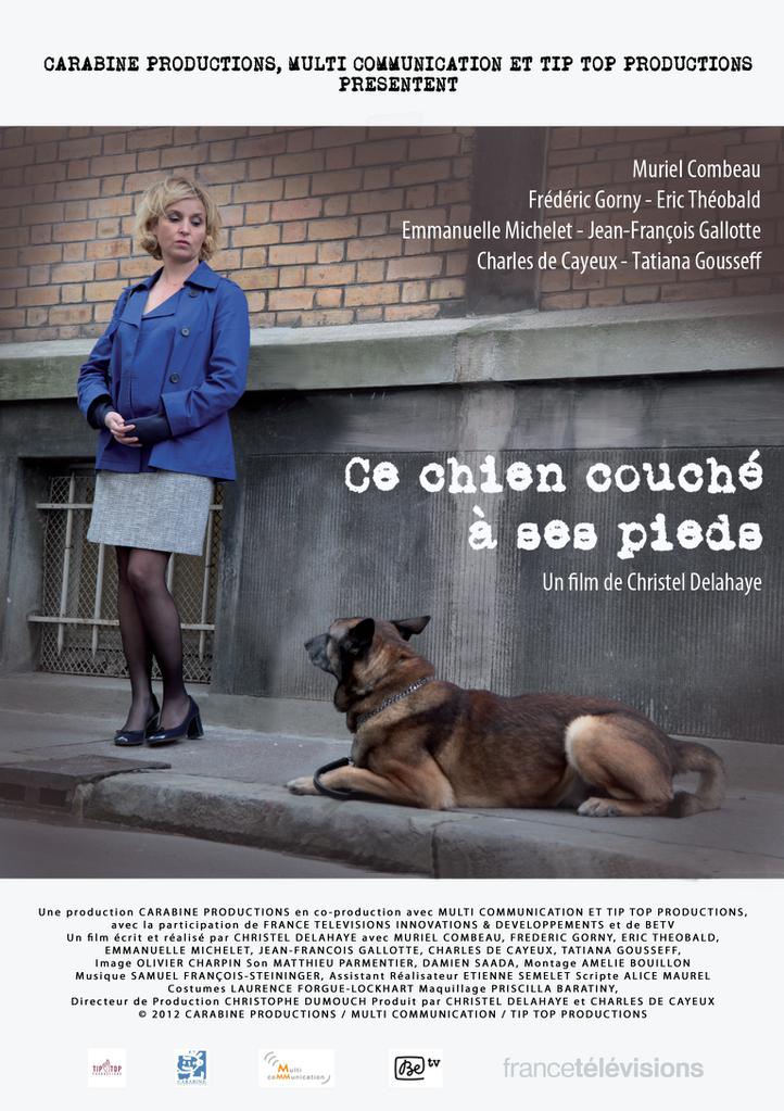 Ce chien couché à ses pieds Ce chien couché à ses pieds